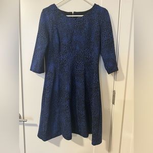 Party dress with flattering shape and fun pattern!